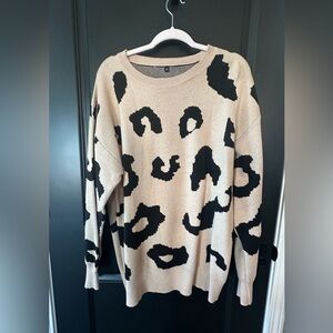 Leopard print sweater.